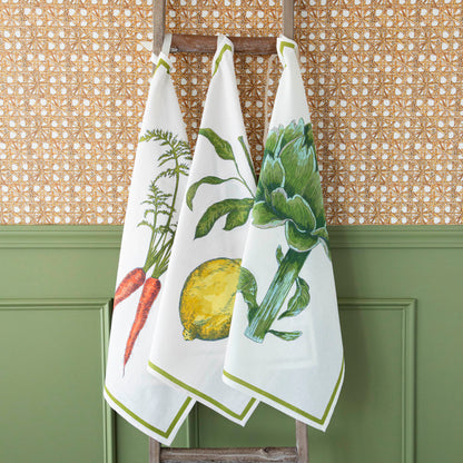 Illustration of two carrots with green tops on a Mahogany Carrot Flour Sack Kitchen Towel Set of 2 set on a white background with a green border.