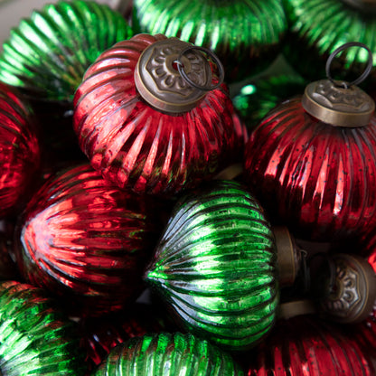 Close up of red and green mini ribbed ornaments together.