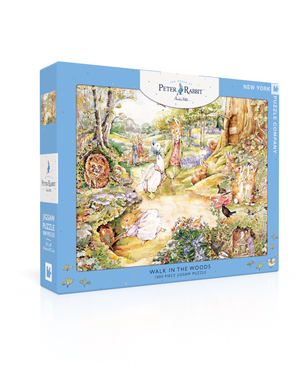 Puzzle box featuring a scene from Peter Rabbit with characters in a forest setting.