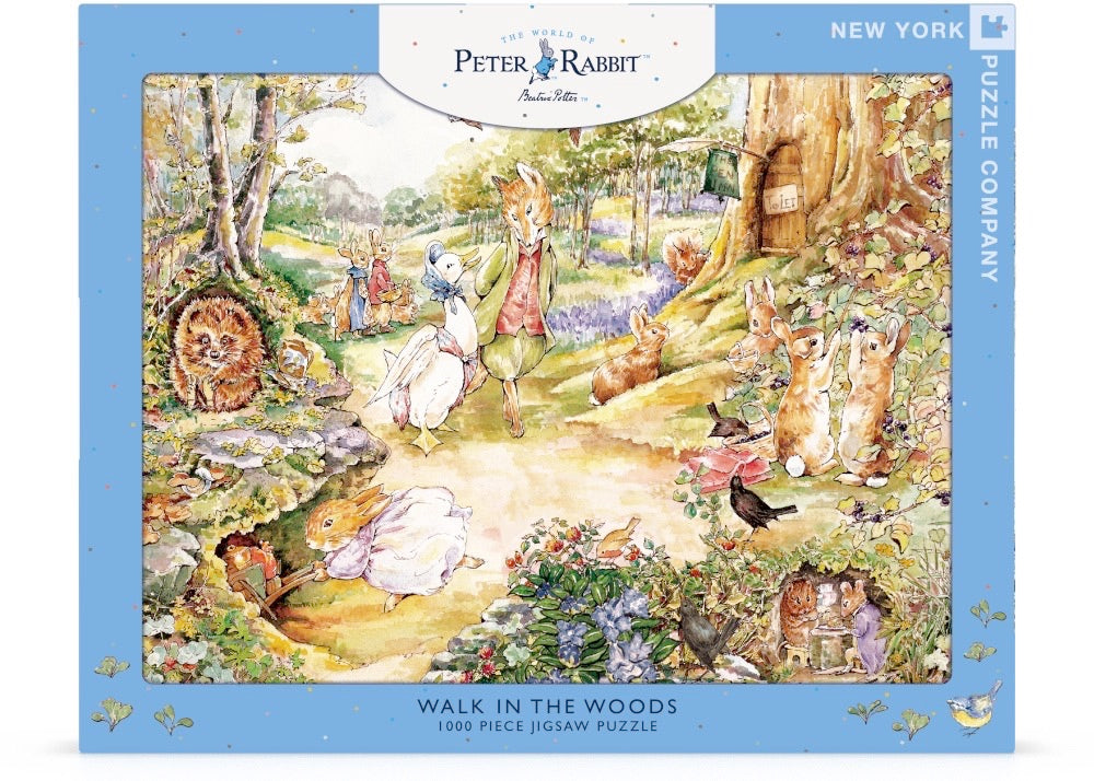 Peter Rabbit puzzle box with illustration of rabbits in a forest scene.