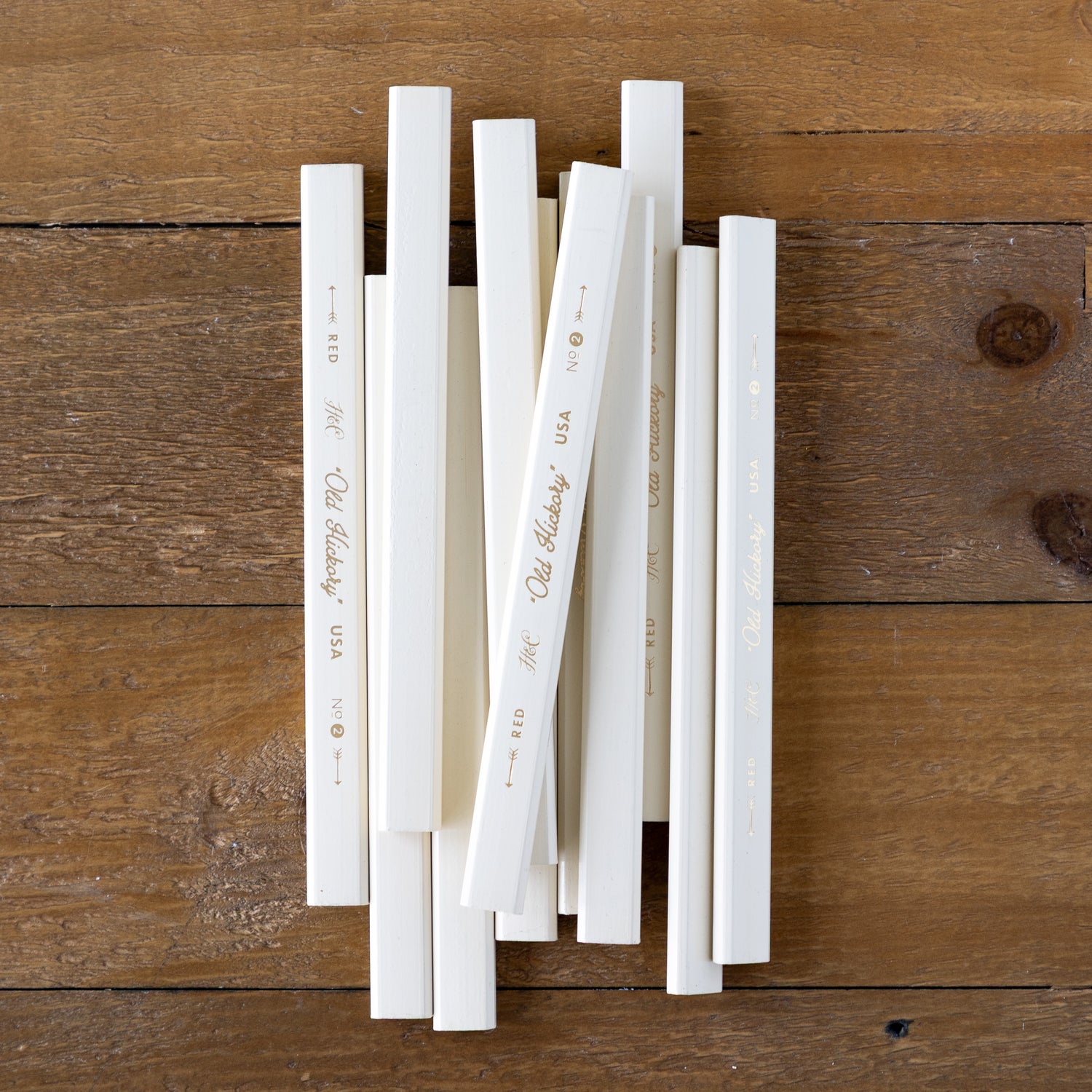 Old Hickory Carpenter Pencils on a wood surface. 