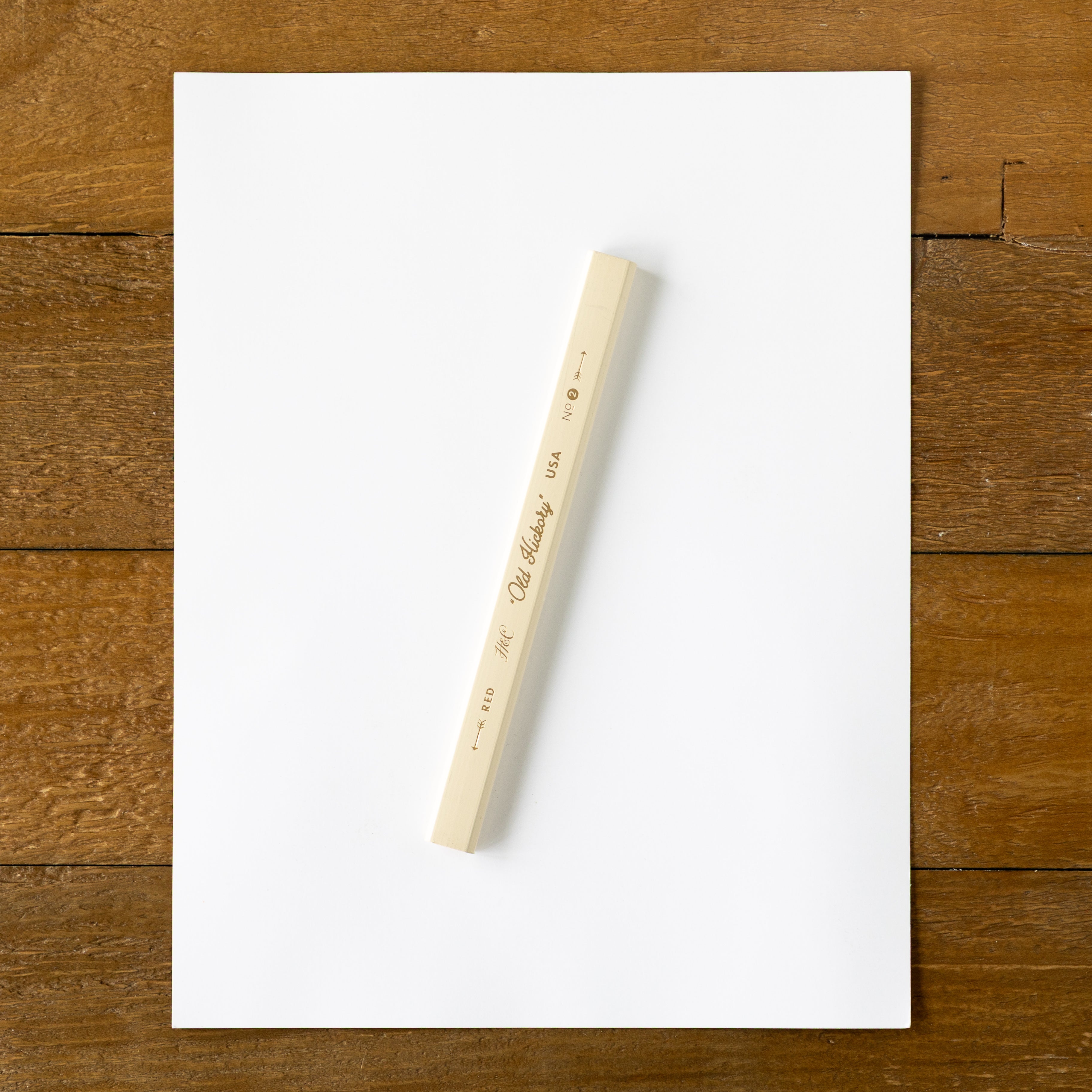 Old Hickory Carpenter Pencil on a white piece of paper. 