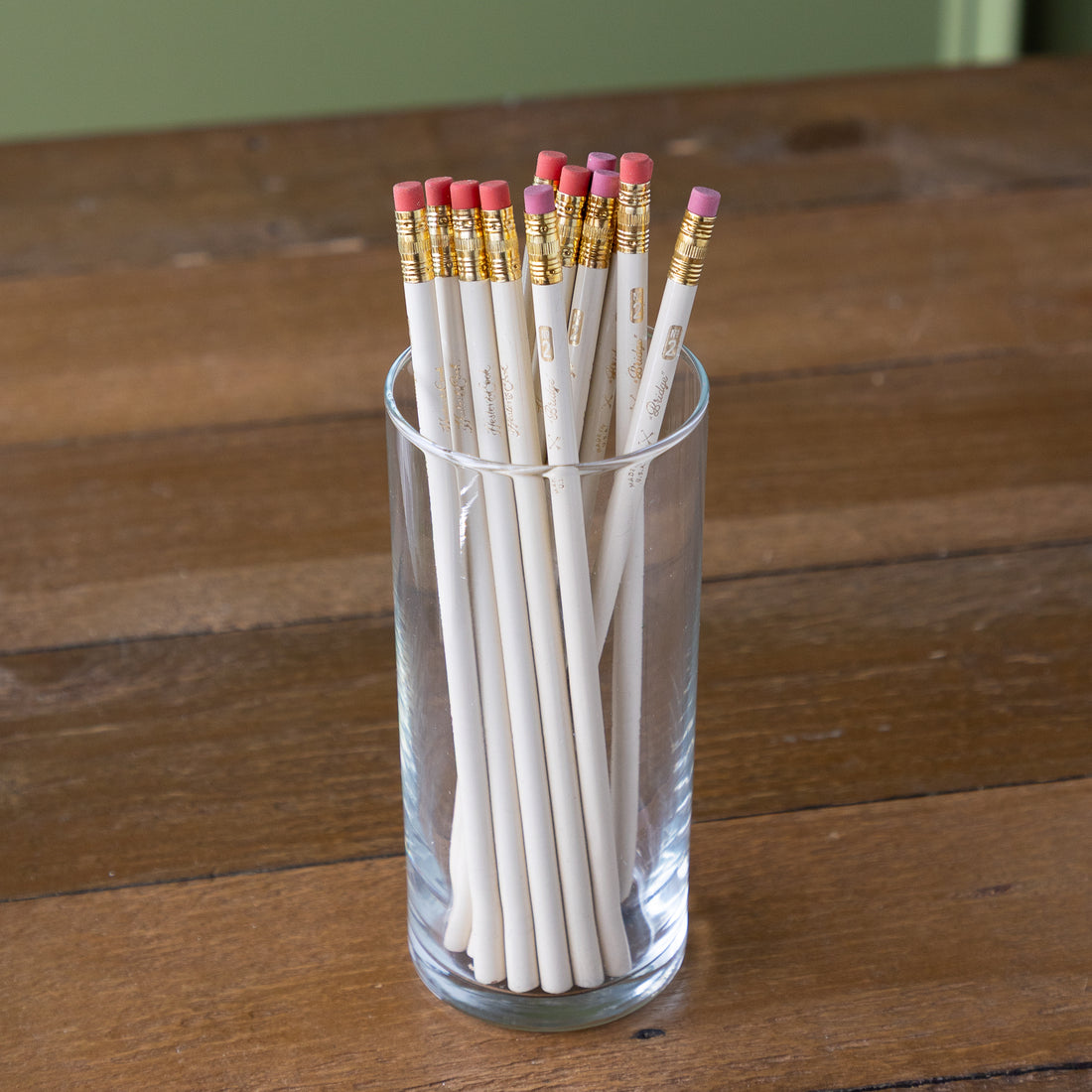 Group of Bridge Pencils in a glass cup. 