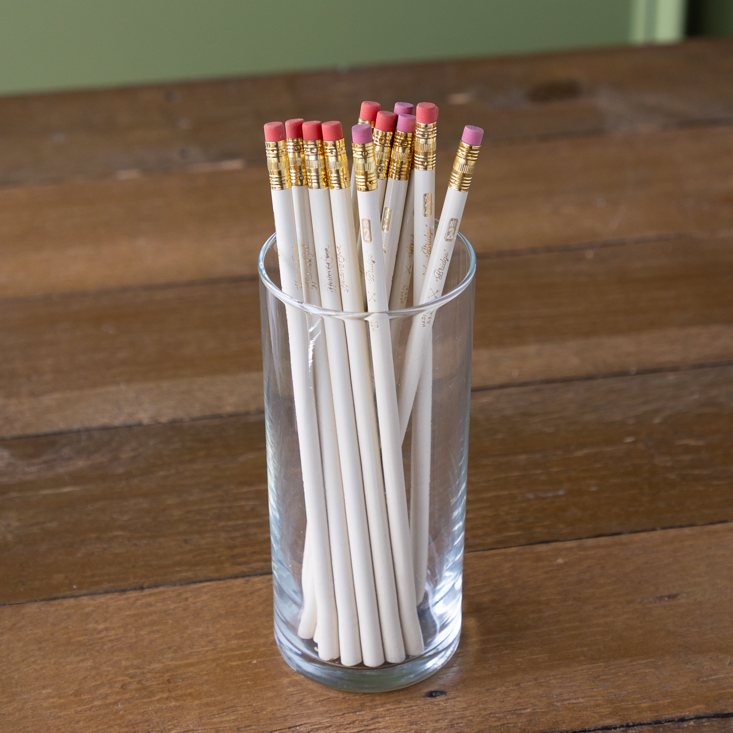 Group of Bridge Pencils in a glass cup. 