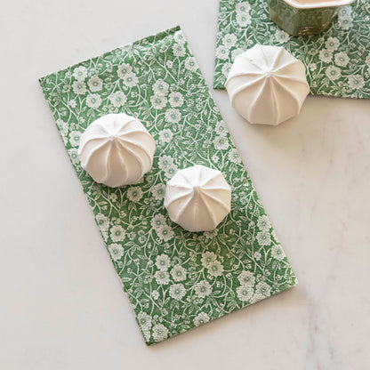Introducing the exquisite Hester &amp; Cook Green Calico napkin from our enchanting floral collection. Perfectly designed for enhancing your table setting with its captivating floral patterns, this napkin is a must-have addition to your.