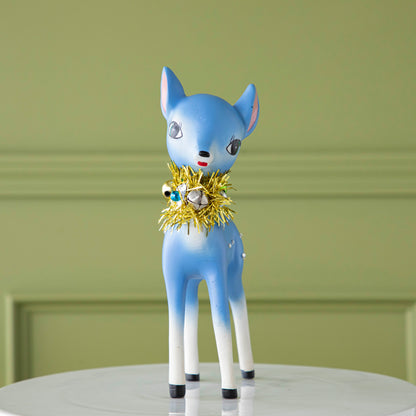 The blue Retro Reindeer on a cake stand.