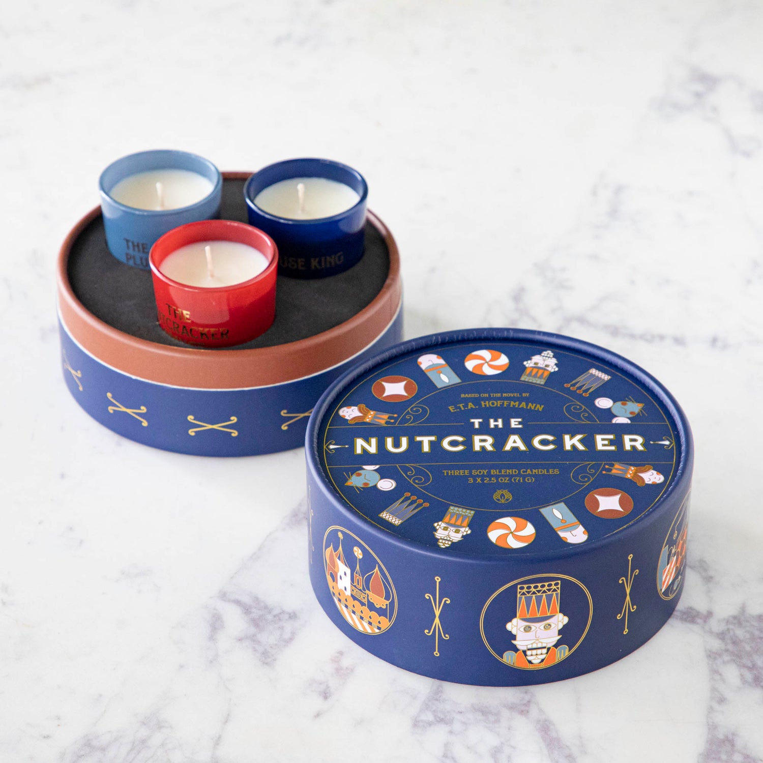 Set of 3 Nutcracker candles inside of the gift box they come in. 