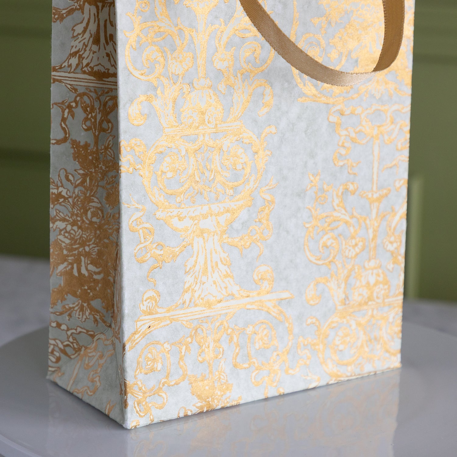 Gilded Scroll Cub Bag