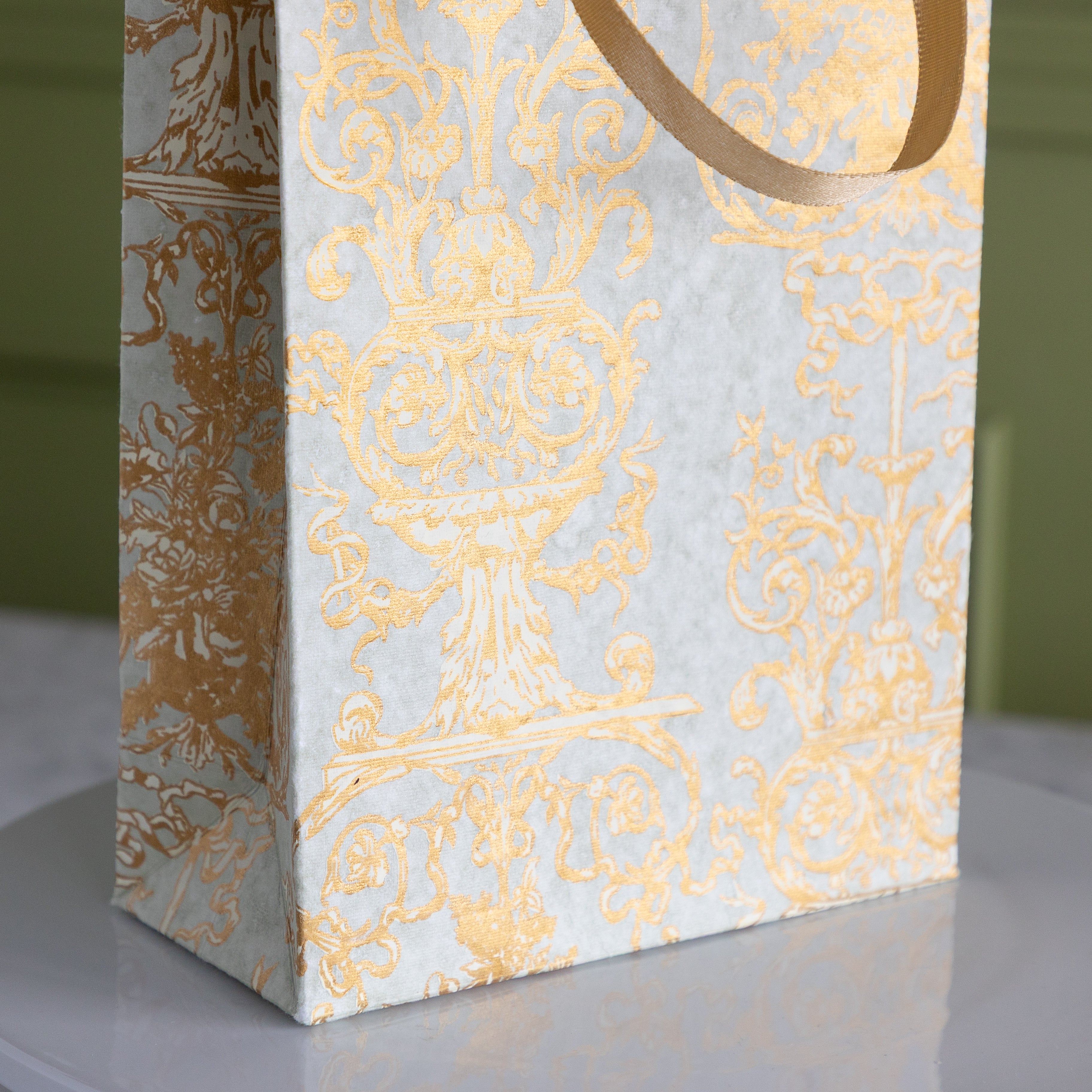 Gilded Scroll Cub Bag