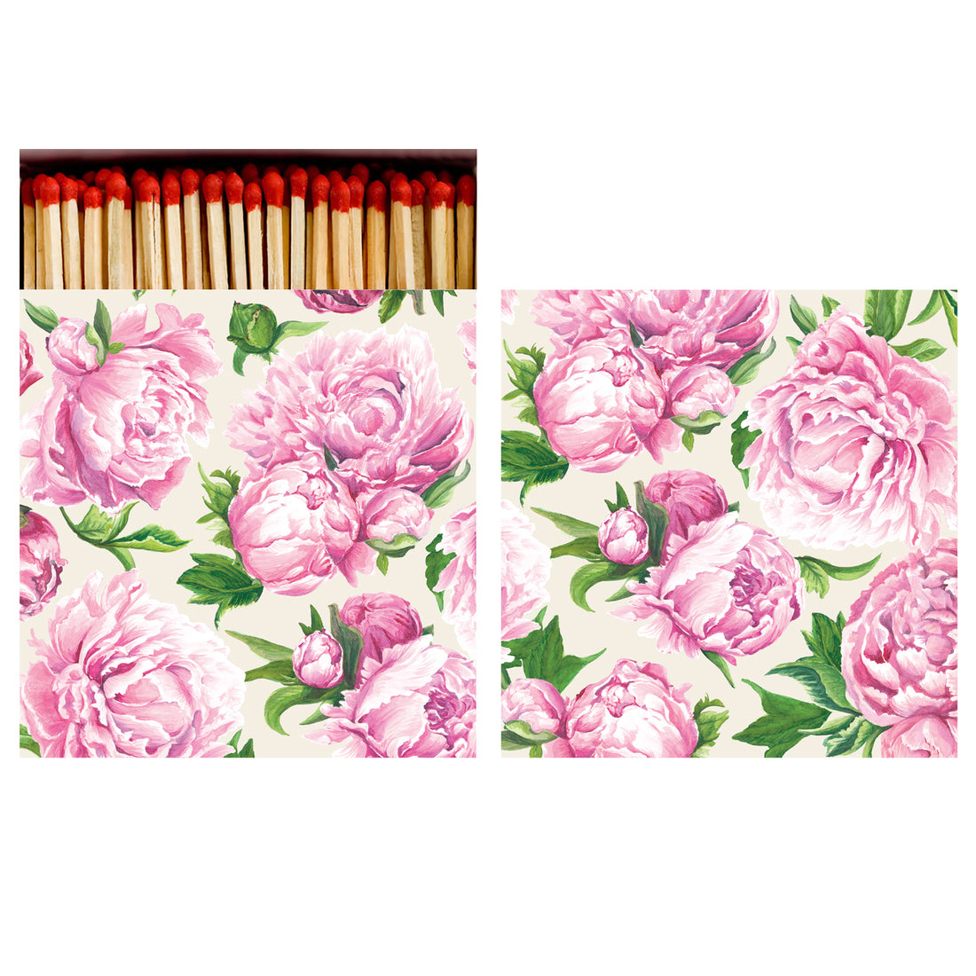 Two sides of a square match box, the left of which is open slightly to reveal the matches inside. The artwork on the box depicts large light pink peony blooms with deep green leaves scattered over a cream background.
