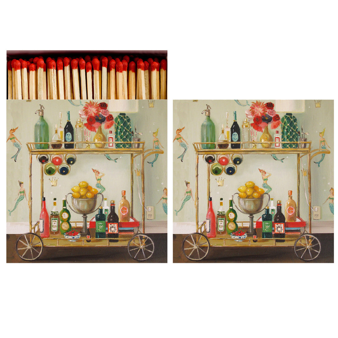 Two identical sides of a square match box, the left of which is open slightly to reveal the matches inside. The artwork on the box depicts a stylized illustration of a mobile bar cart with an assortment of beverages, standing out against a mermaid-themed wallpaper. 