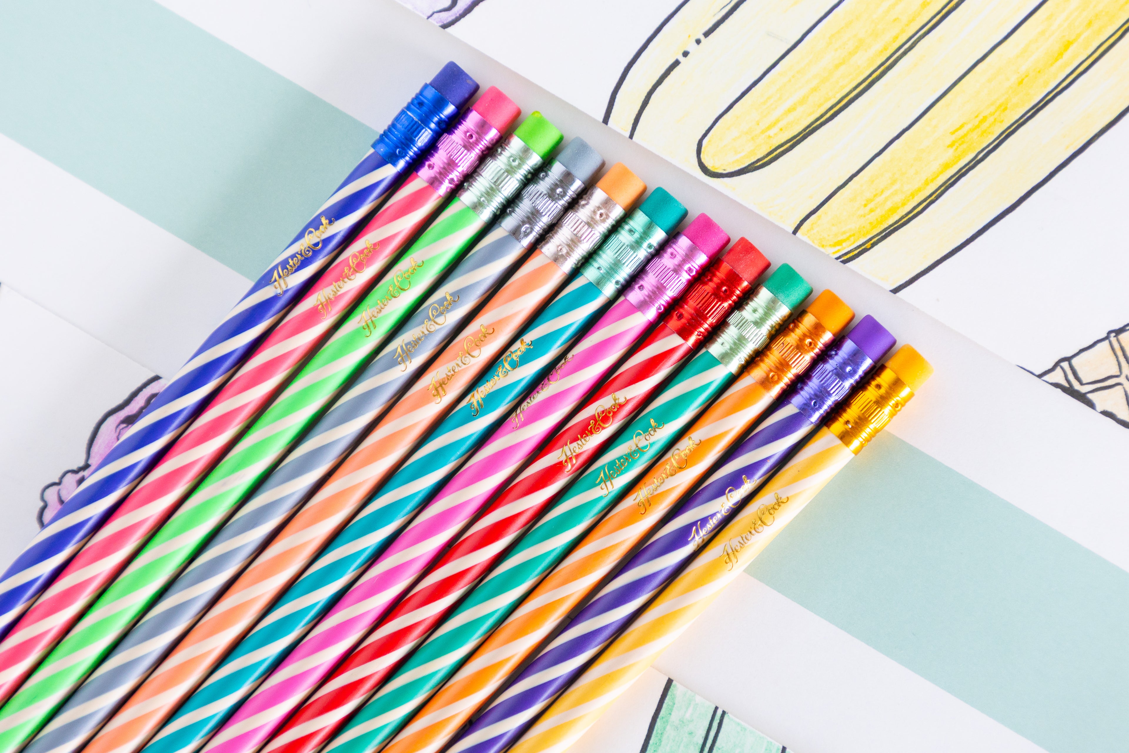 Colorful pencils on a light blue background.