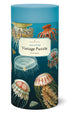 A 1000-piece Cavallini Papers & Co Jellyfish Puzzle featuring vintage illustrations of various jellyfish species from the Cavallini archives, packaged in a cylindrical box.