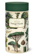 A 1000-piece Arboretum Puzzle featuring arboretum-themed vintage illustrations, packaged in a cylindrical container by Cavallini Papers & Co.