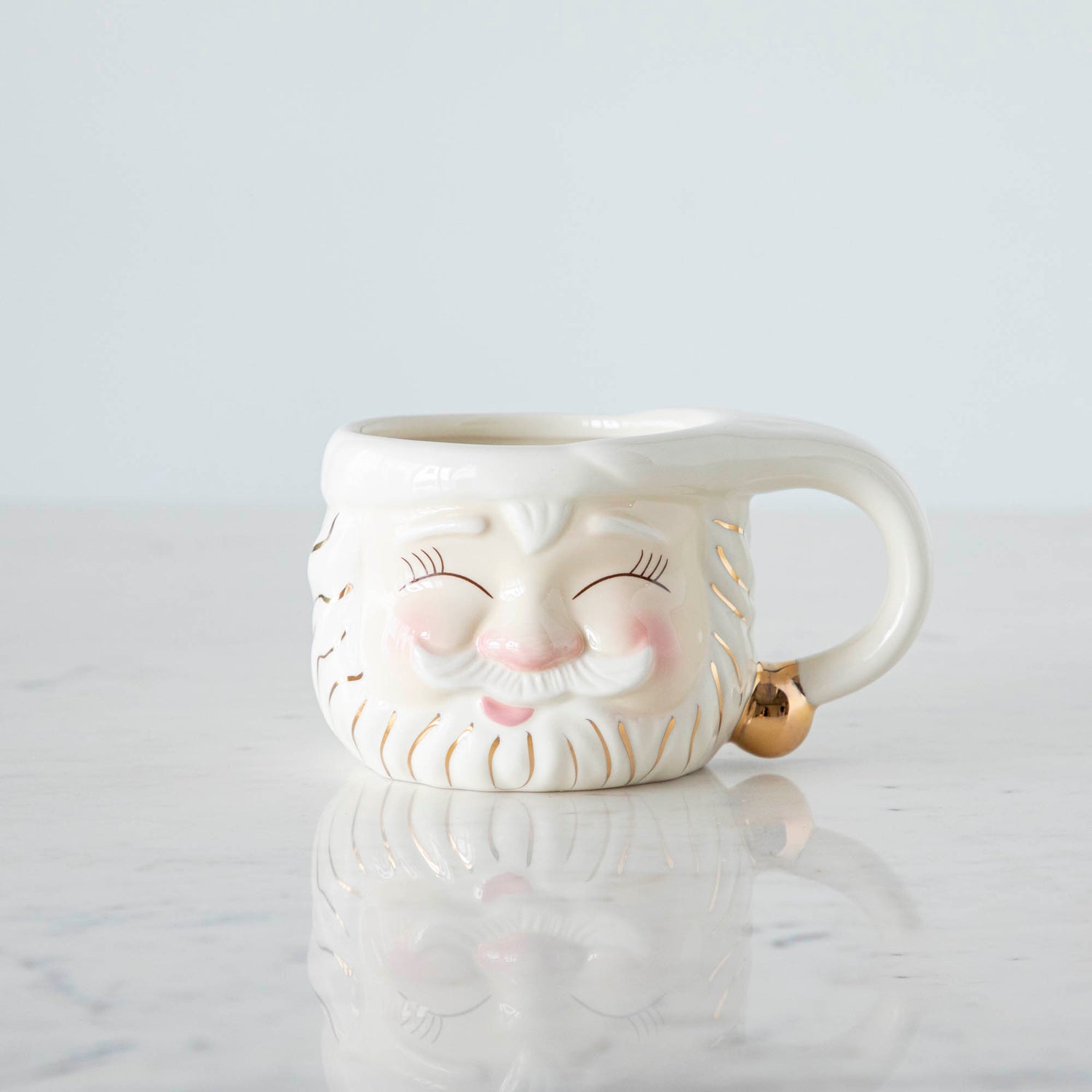 Papa Noel Cream Mug with his eyes closed 