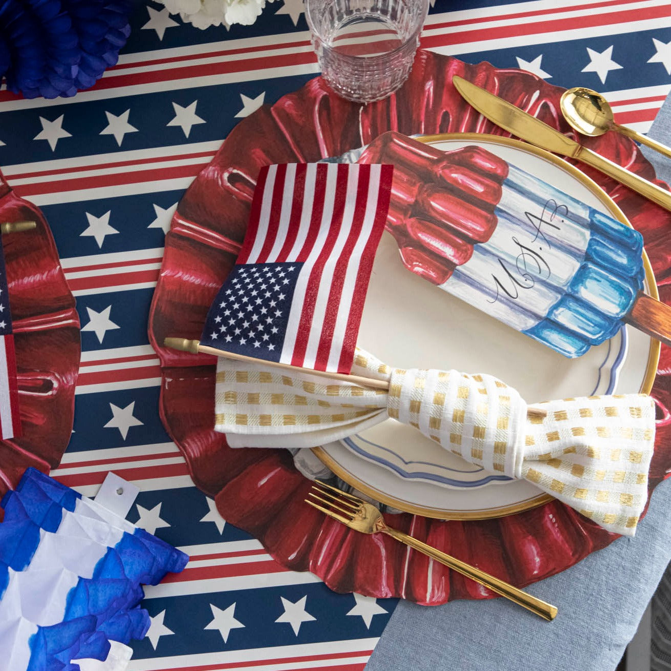 4th of July table setting featuring a Star-Spangled Placemat from Hester &amp; Cook and pack of 12 Die-Cut sheets.