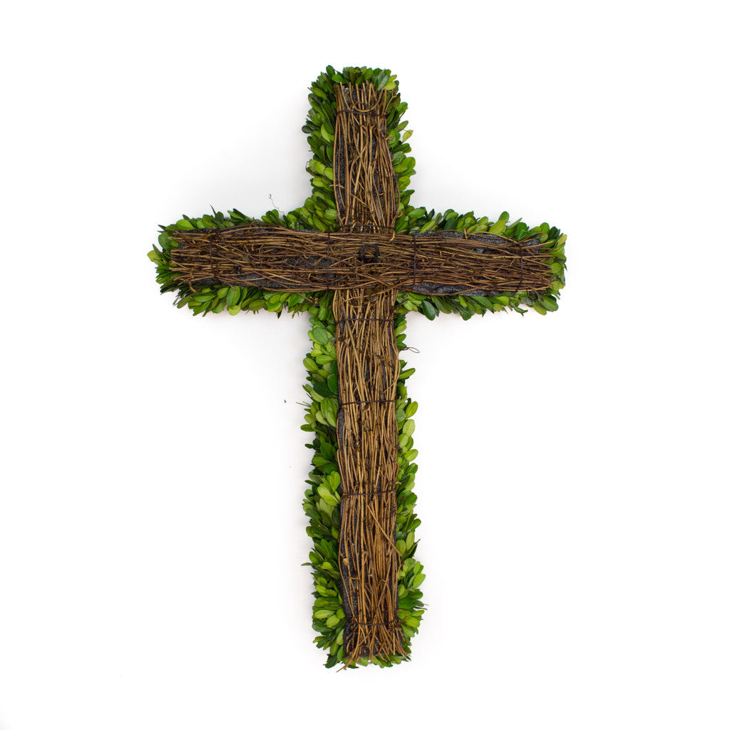 An elegant, Mills Floral Company Preserved Boxwood Cross shaped into a cross and preserved in boxwood, isolated on a white background.