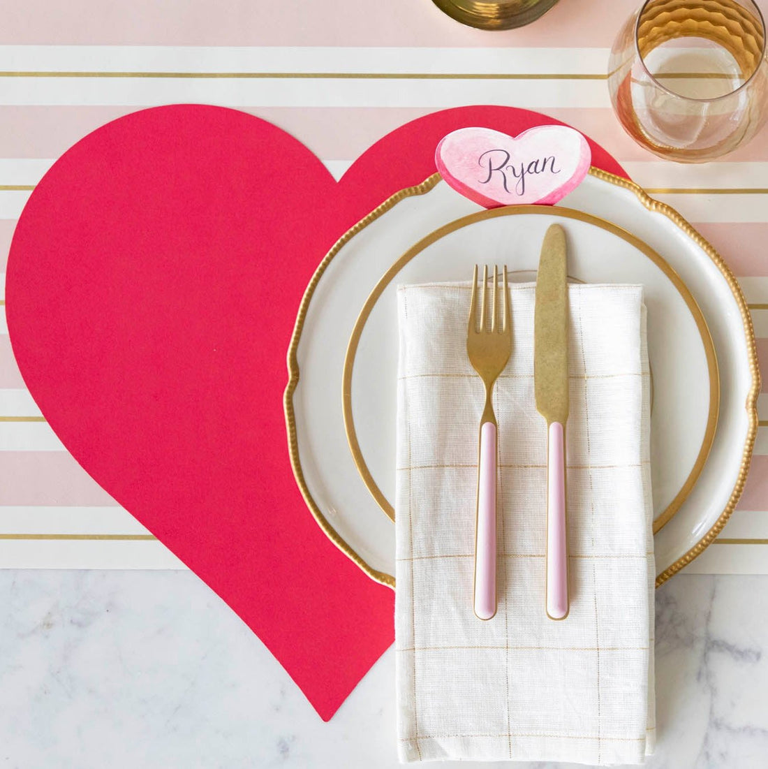 An elegant table setting featuring the Die-cut Red Heart Placemat and Heart Table Card.