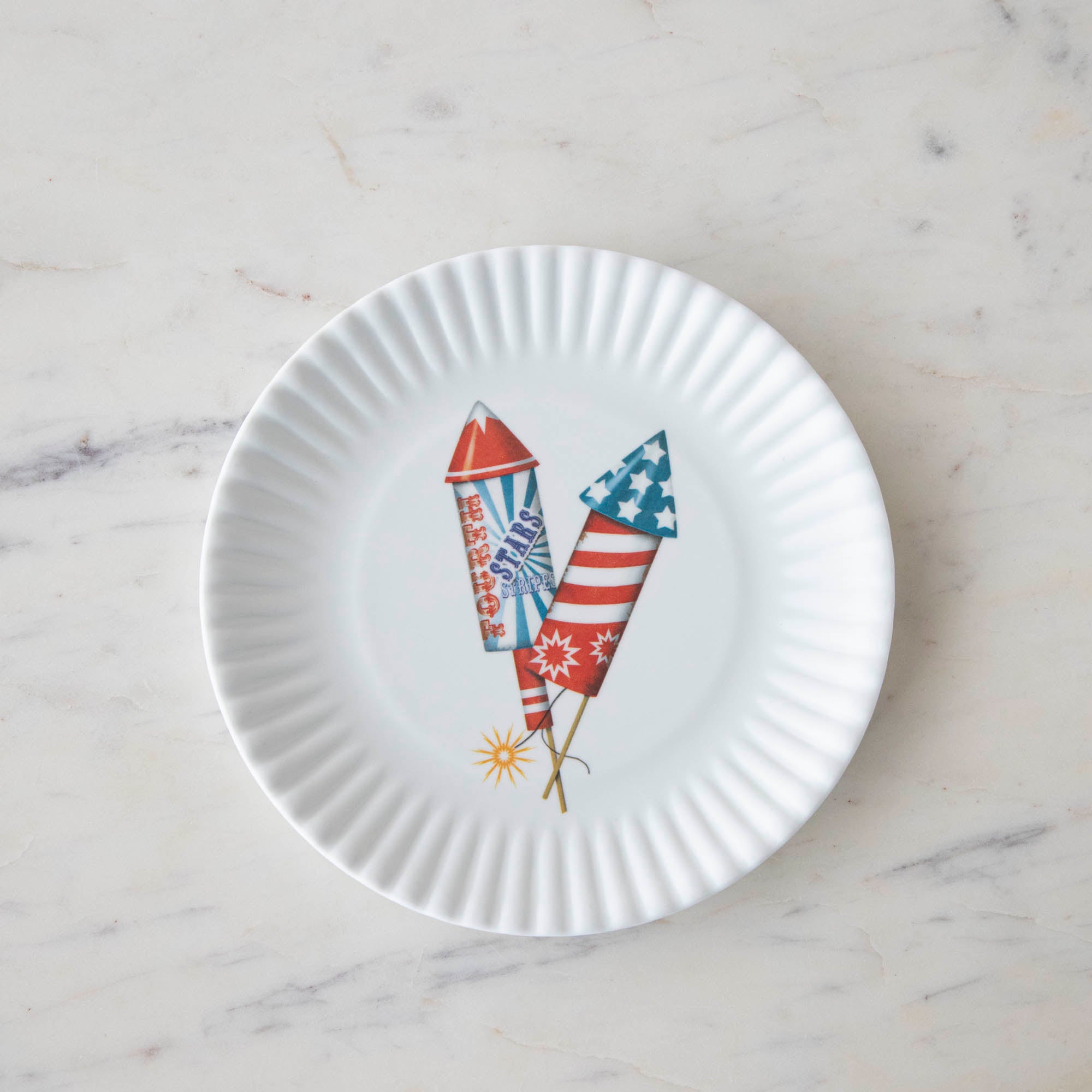 Disposable Melamine American Holiday Plates with Fourth of July-themed decorations on a white background from Glitterville.