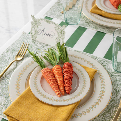 A table setting with Glitterville Natural Carrots on it, perfect for Easter baskets.