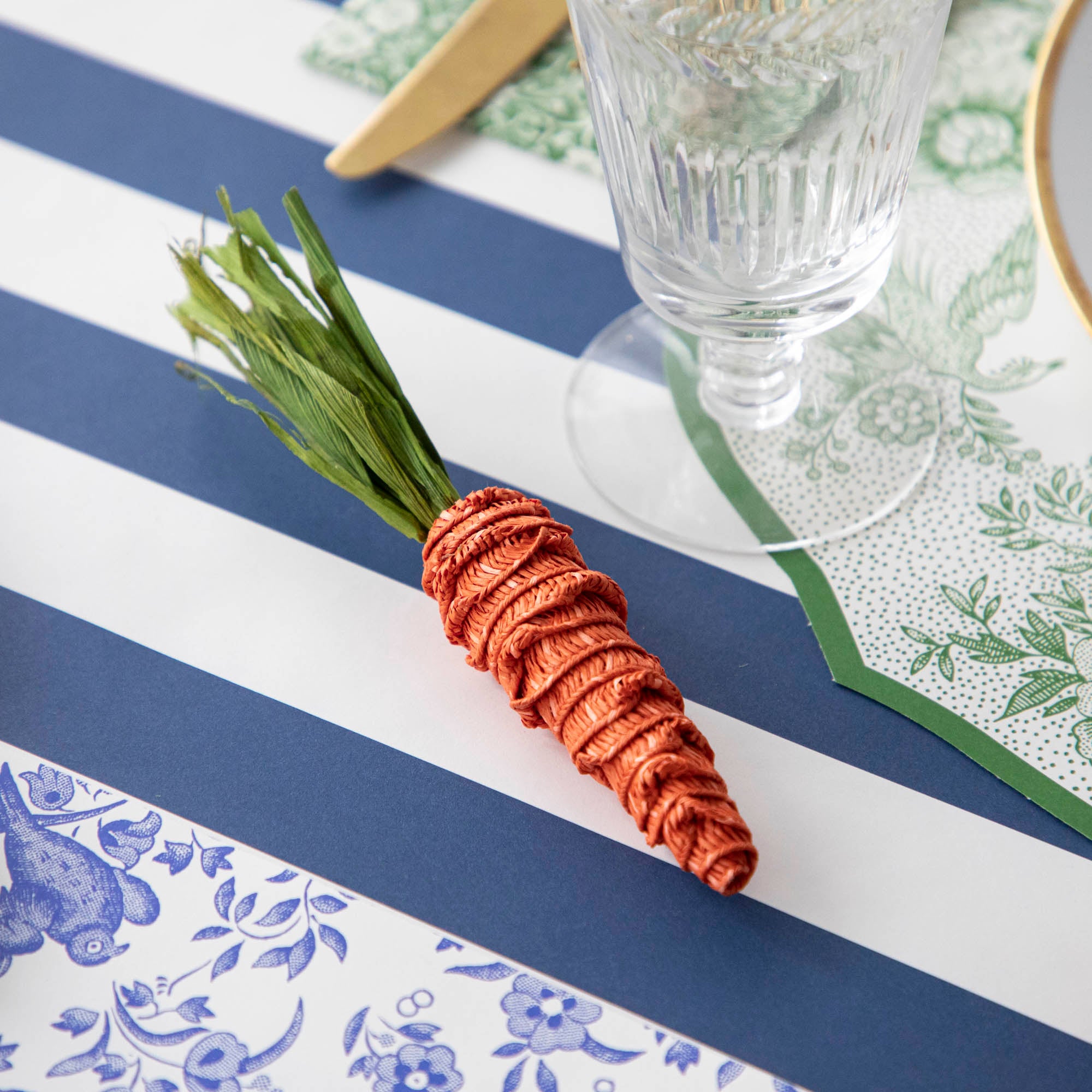 An Easter table setting adorned with a Glitterville Natural Carrots centerpiece.