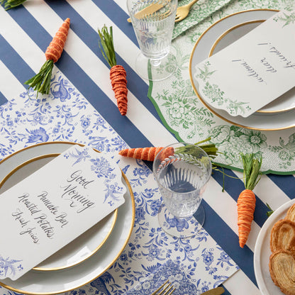 A table setting with Glitterville Natural Carrots on it.