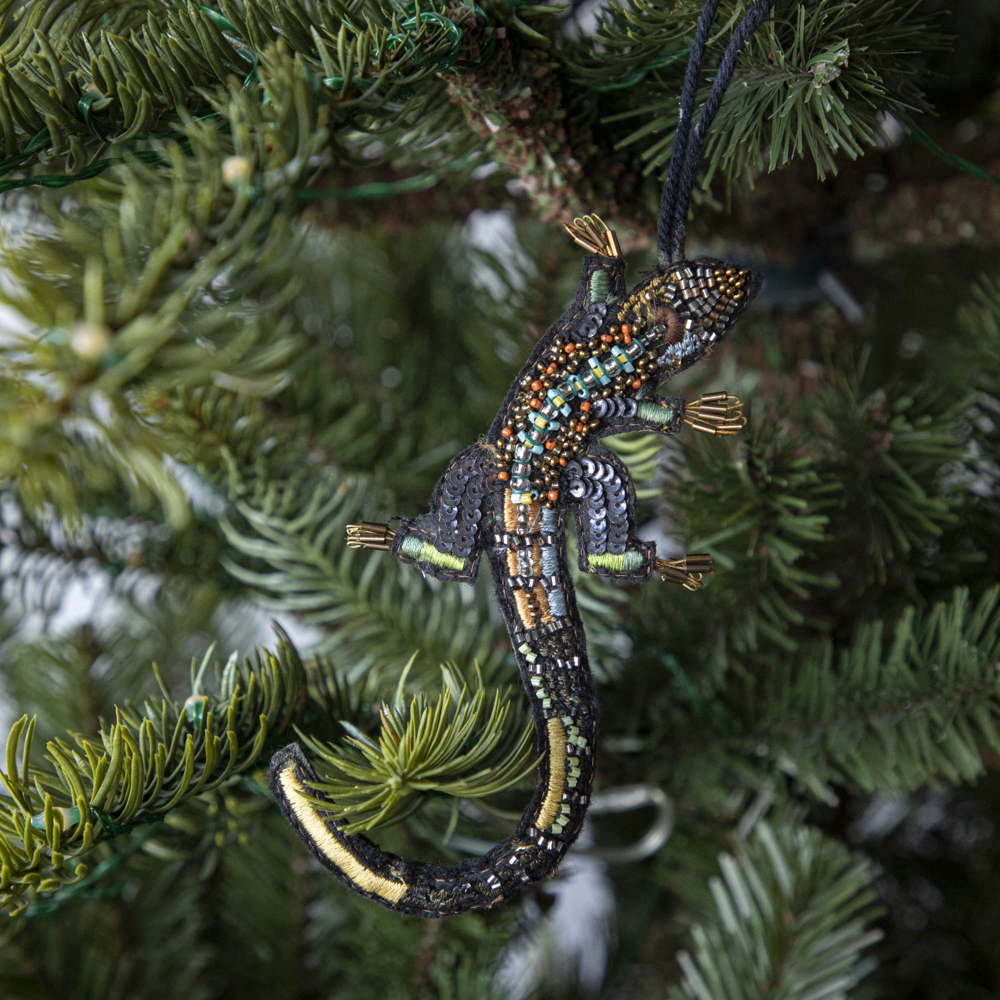 Beaded Lizard Ornament hanging in a Christmas Tree