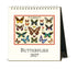 A desk calendar featuring vintage butterfly illustrations. 