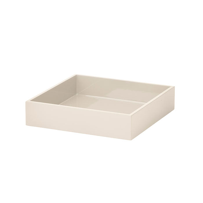 Cream square lacquer box on a white background. 
