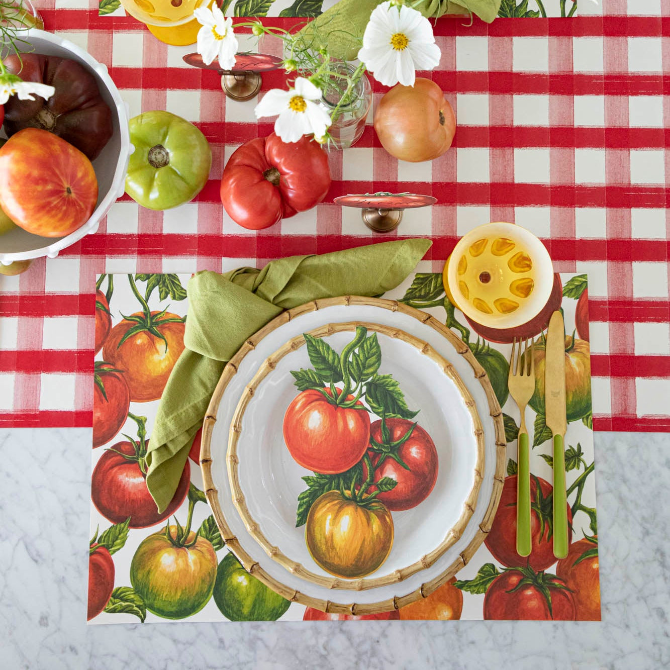 A summery, tomato themed table setting, with the Tomato Vine Placemat on the Red Painted Check Runner.