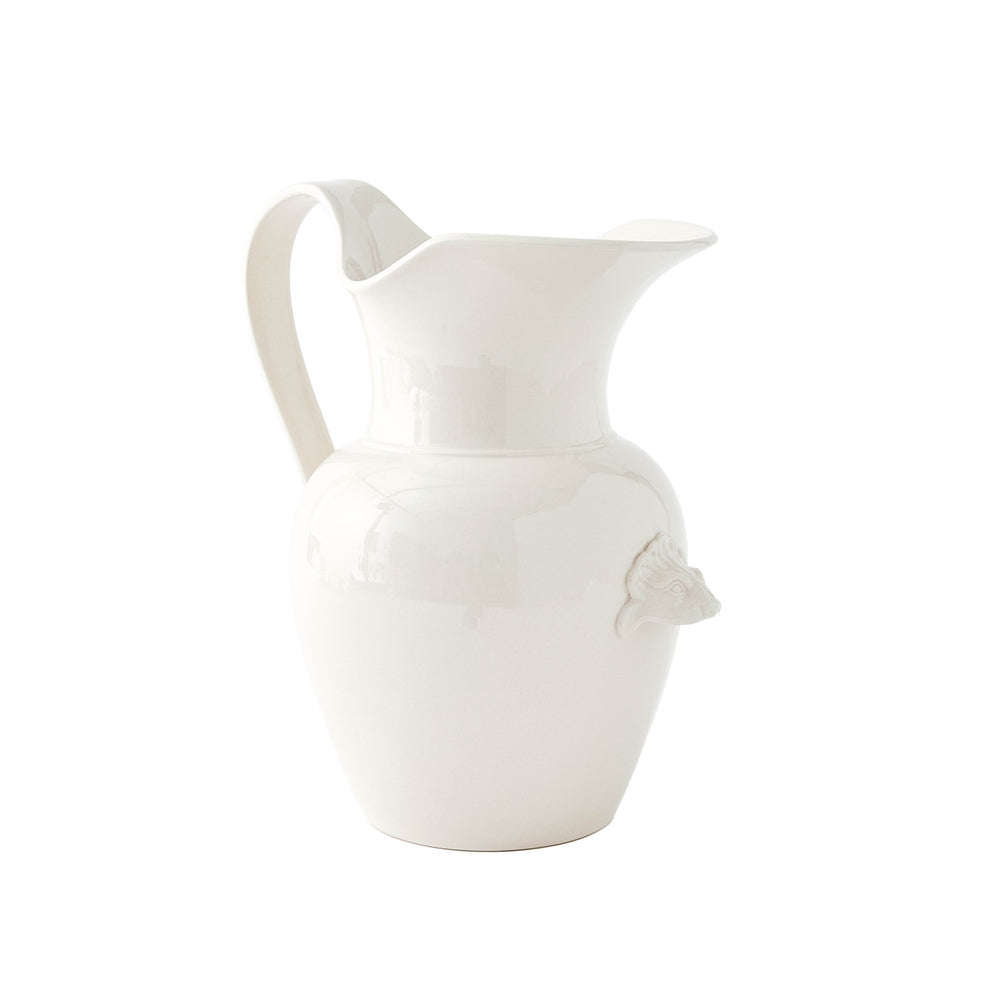 White ceramic pitcher on a white background.