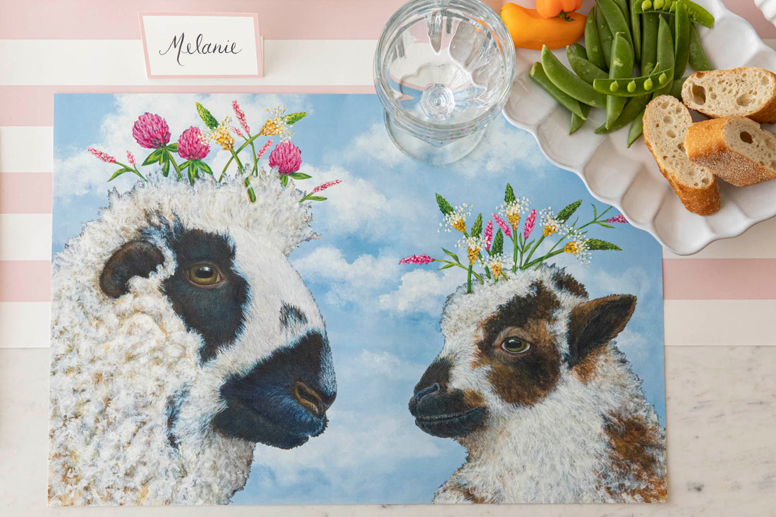 Two sheep with flowers on their heads on a Hester &amp; Cook &quot;I Love Ewe&quot; placemat.