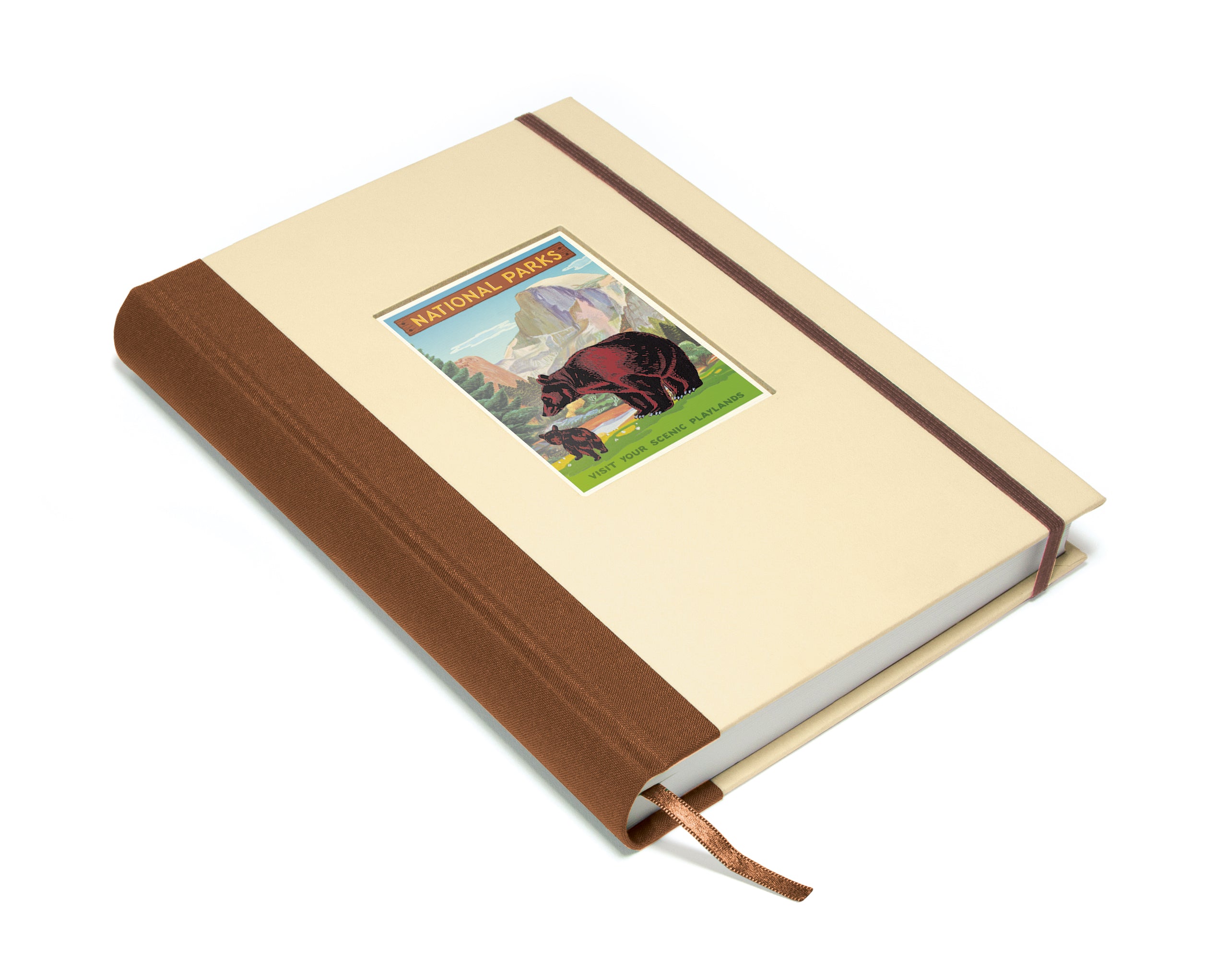 Notebook with a brown leather cover and a decorative label on a white background.