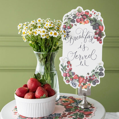 Berry Bramble Table Accent with &quot;Breakfast is Served&quot; written in script, held by the Chrome Place Card Holder.