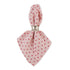 A pink cloth napkin with a red heart pattern, neatly folded and tied with a metallic silver band, shown against a plain white background.