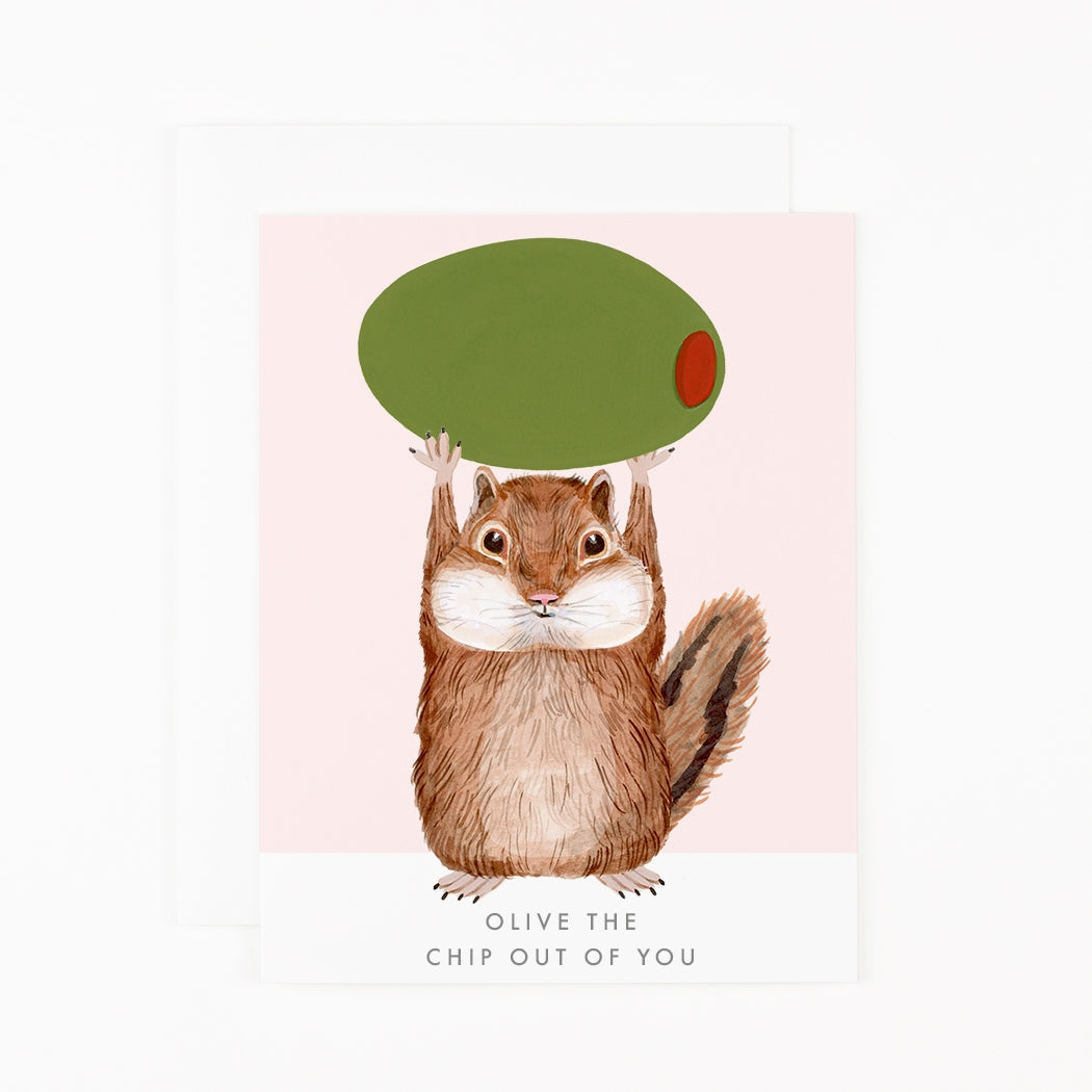 Greeting card by Dear Hancock with an illustration of a chipmunk holding up an olive with "Olive the chip out of you" printed on the bottom.