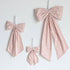 Set of pink checkered bows on a white background