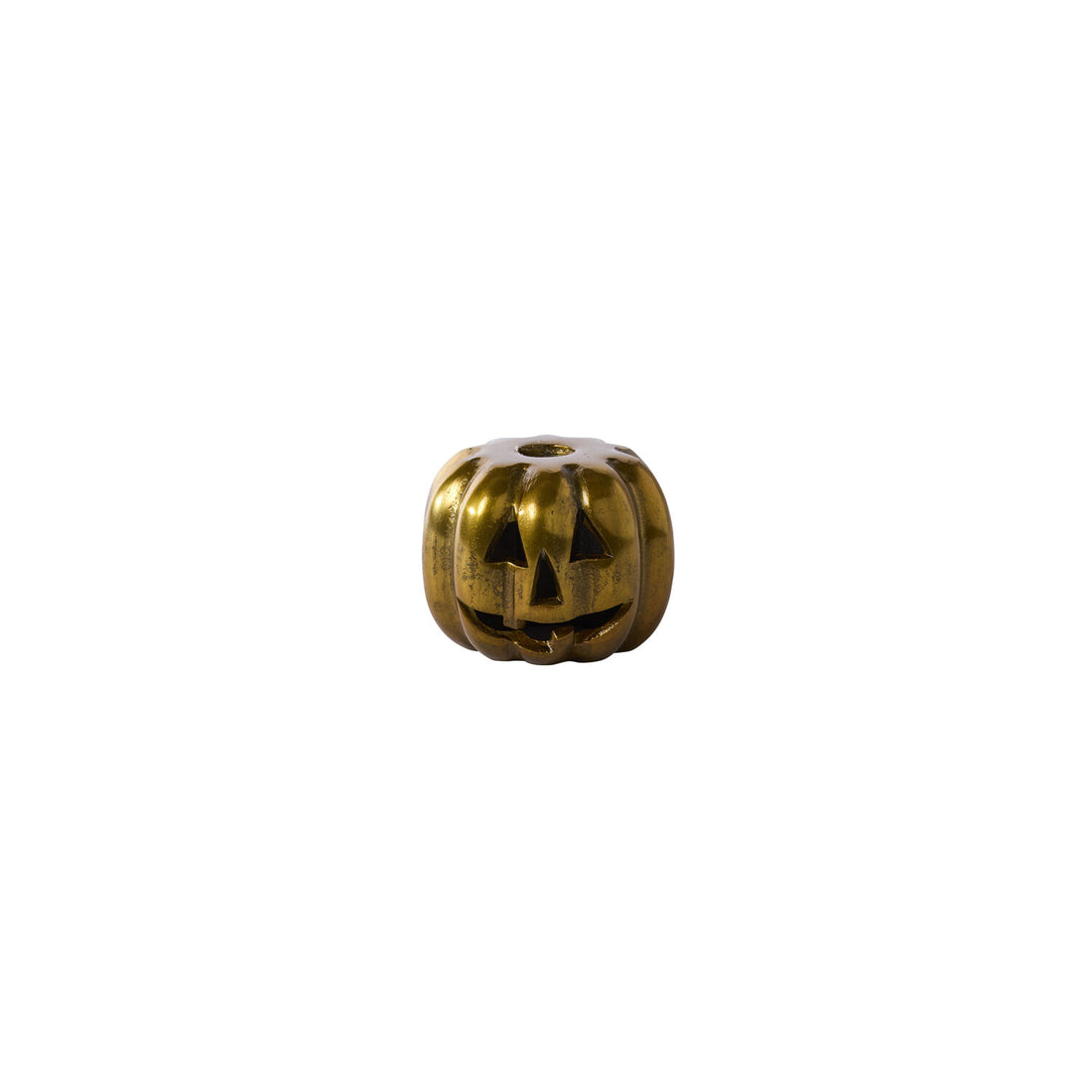 Gold pumpkin-shaped candleholder with a face on a white background.