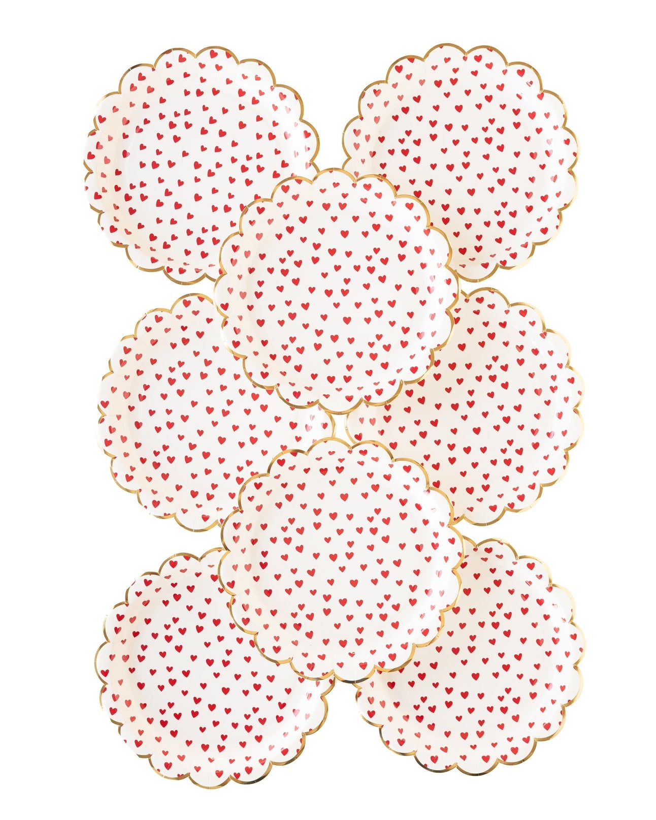 A group of 8 white scalloped plates with red hearts.  