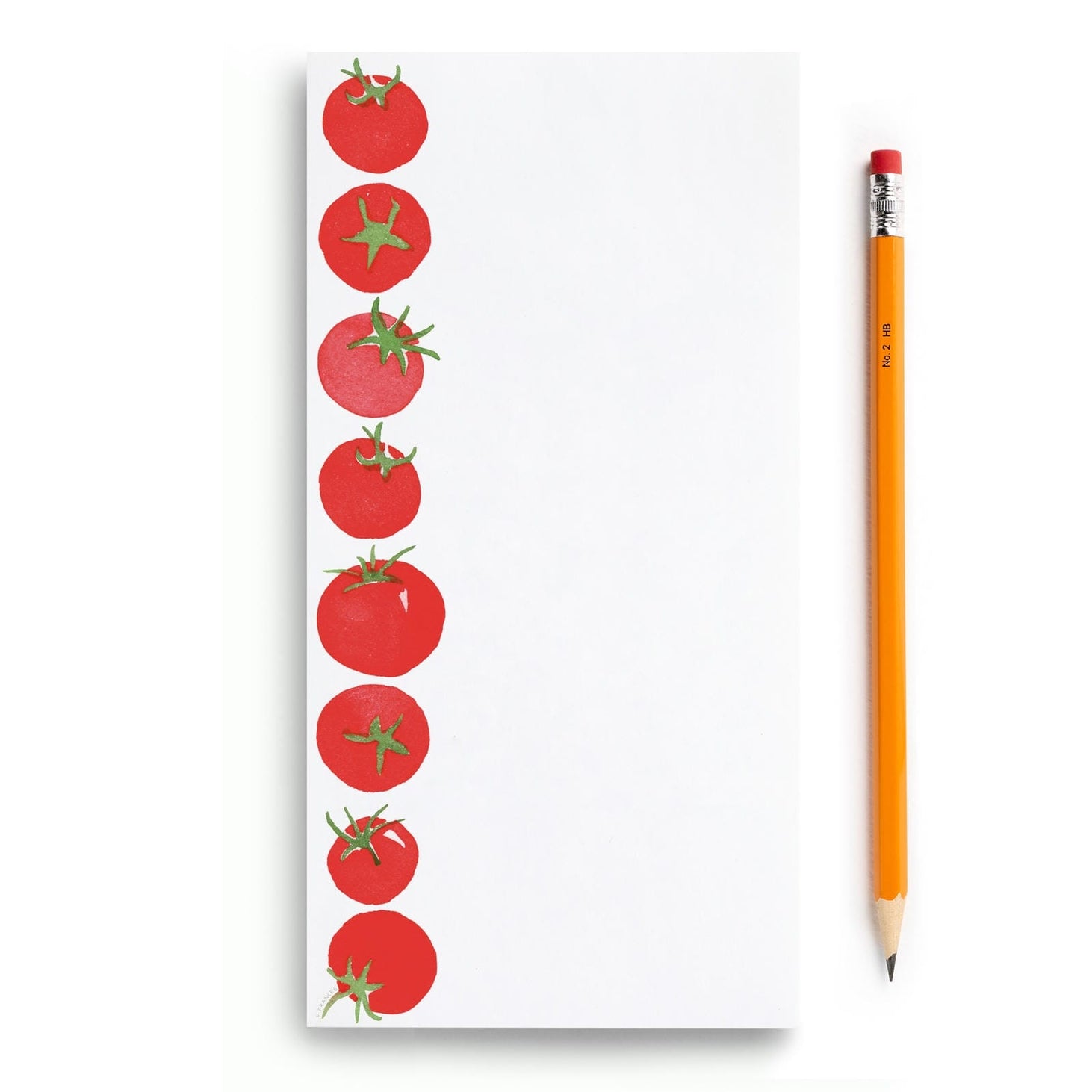 Notepad with tomato design and a pencil on a white background.