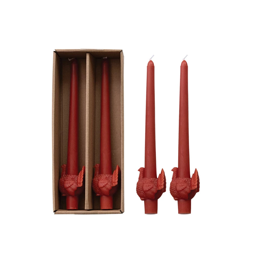 Two Unscented Turkey Taper Candles packaged and two on a white background.