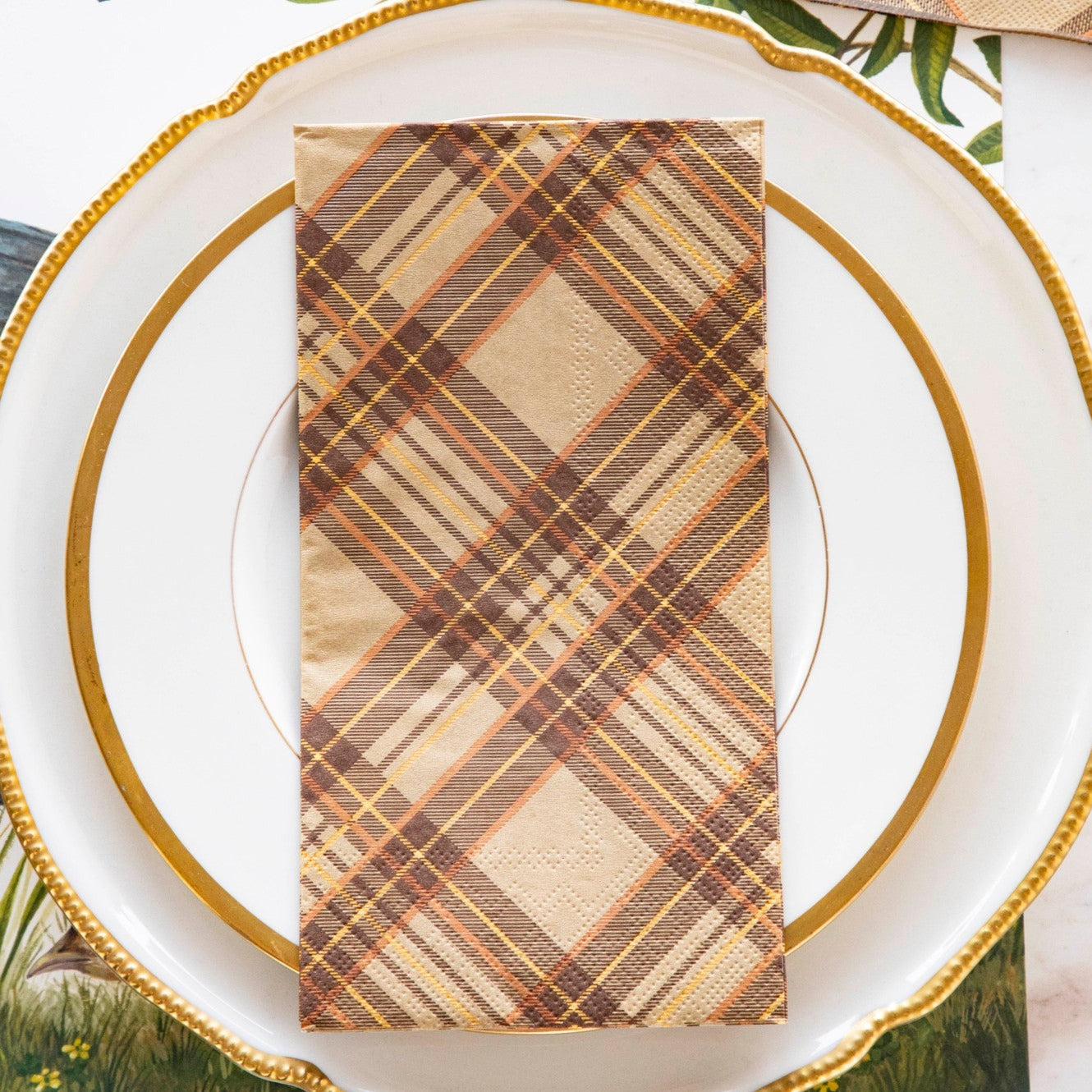 A Hester &amp; Cook Autumn Plaid Napkin, perfect for Thanksgiving.