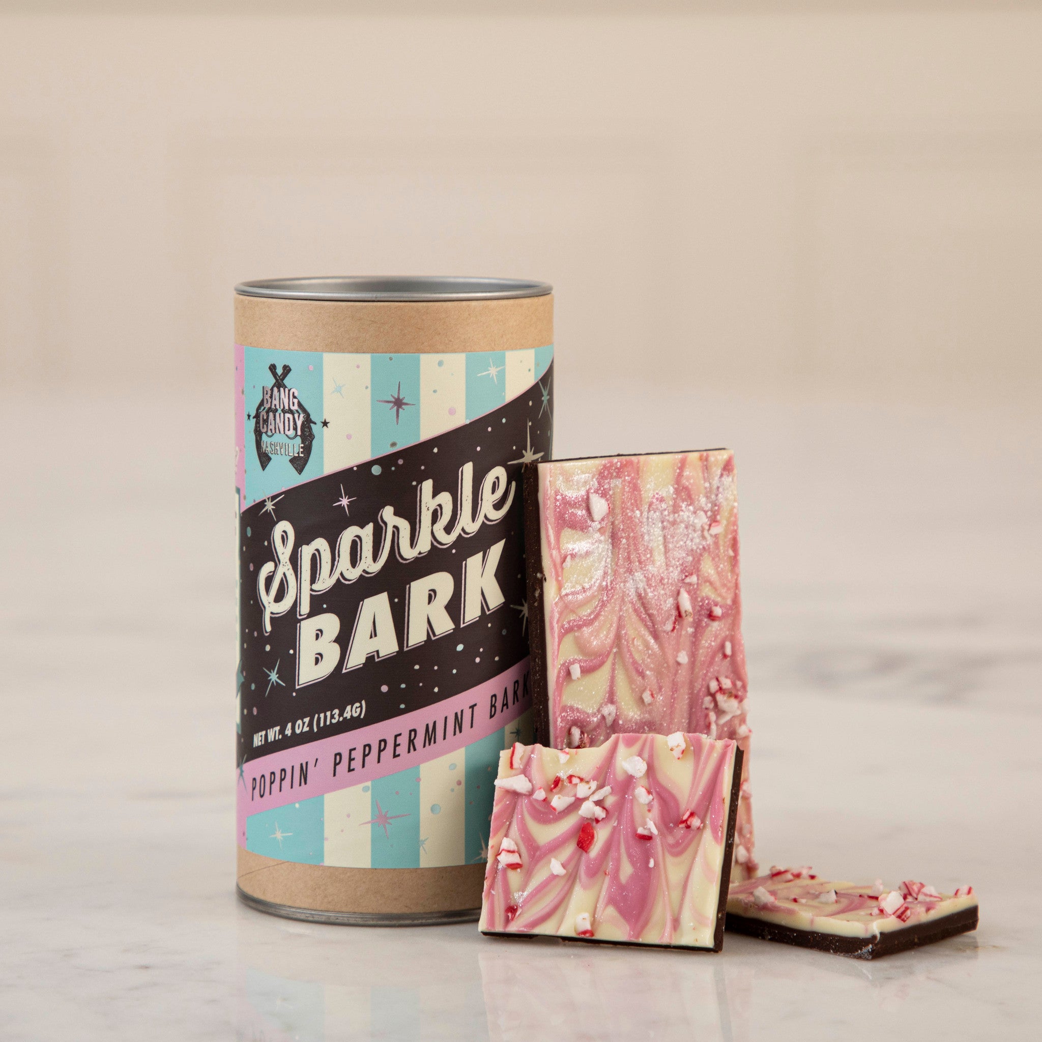 A can of Hester &amp; Cook Sparkle Bark, an all-natural chocolate treat.