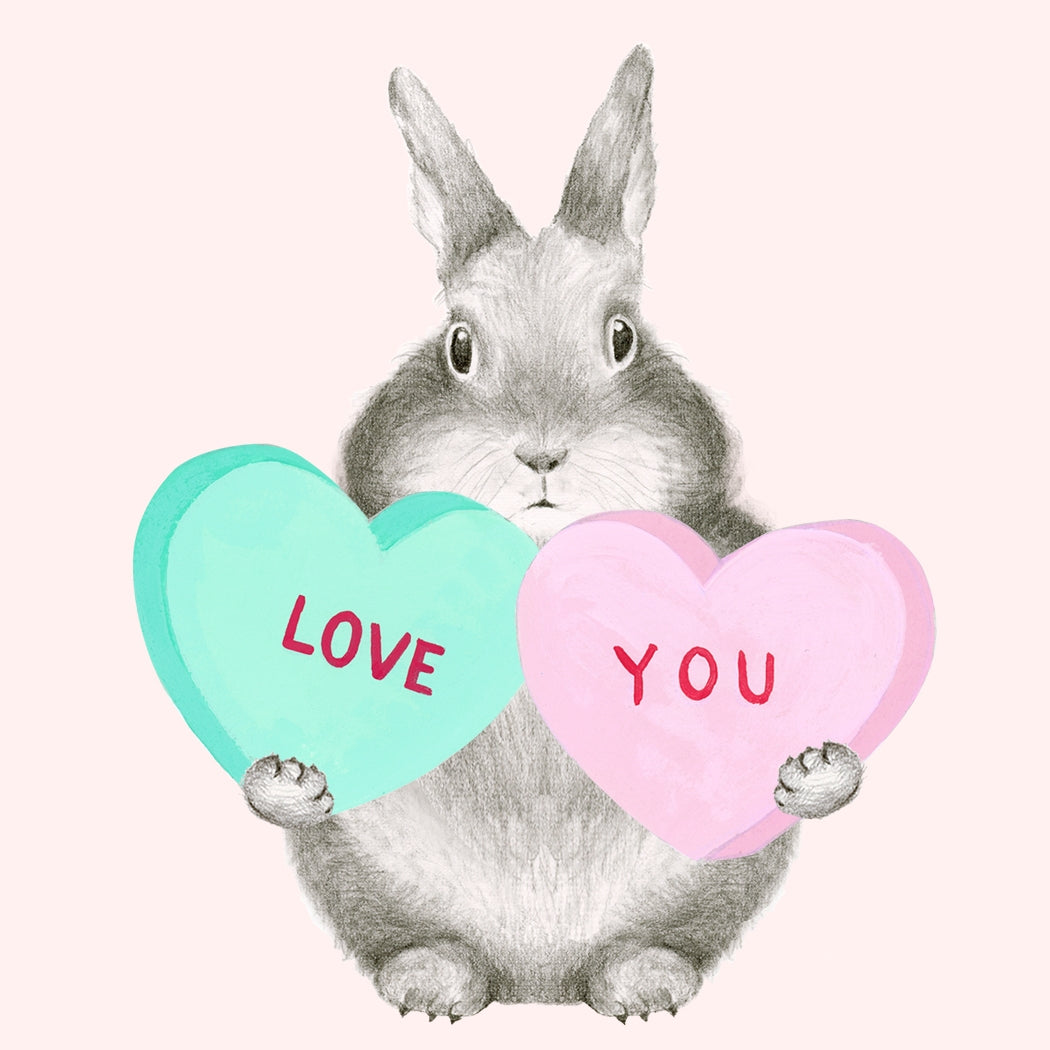 Gray rabbit holding two heart-shaped signs with &