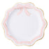 Decorative plate with pink bow and scalloped edge on a white background.