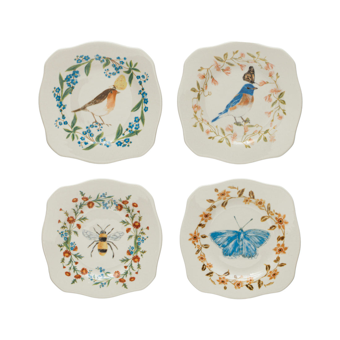 Four decorative plates with animal and floral designs on a white background.