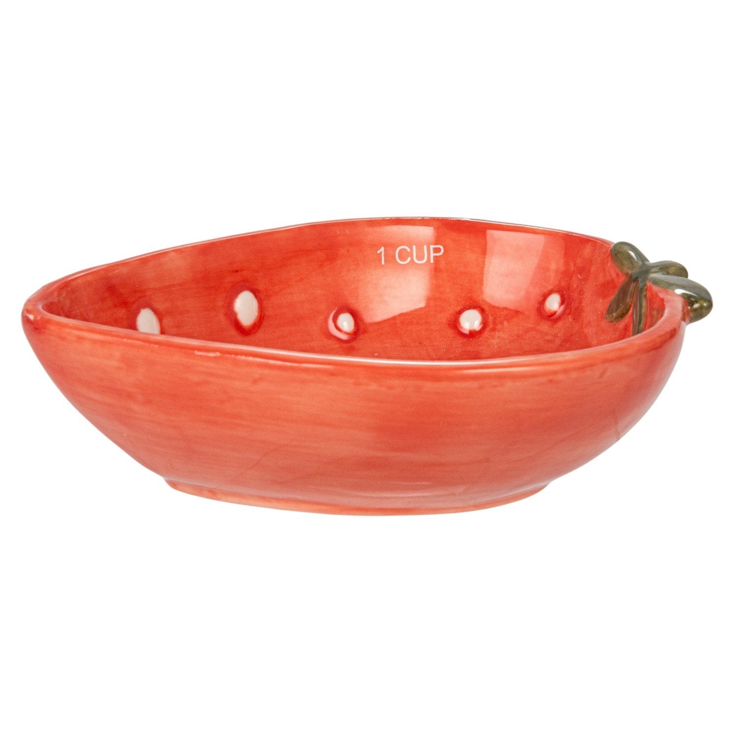 Red ceramic measuring cup on a white background.