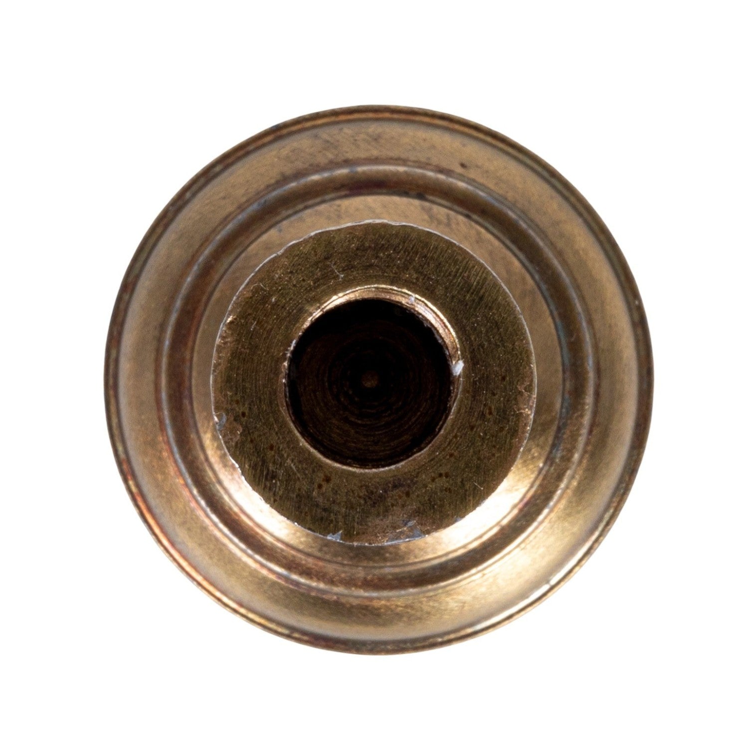 Brass candle holder on a white background.