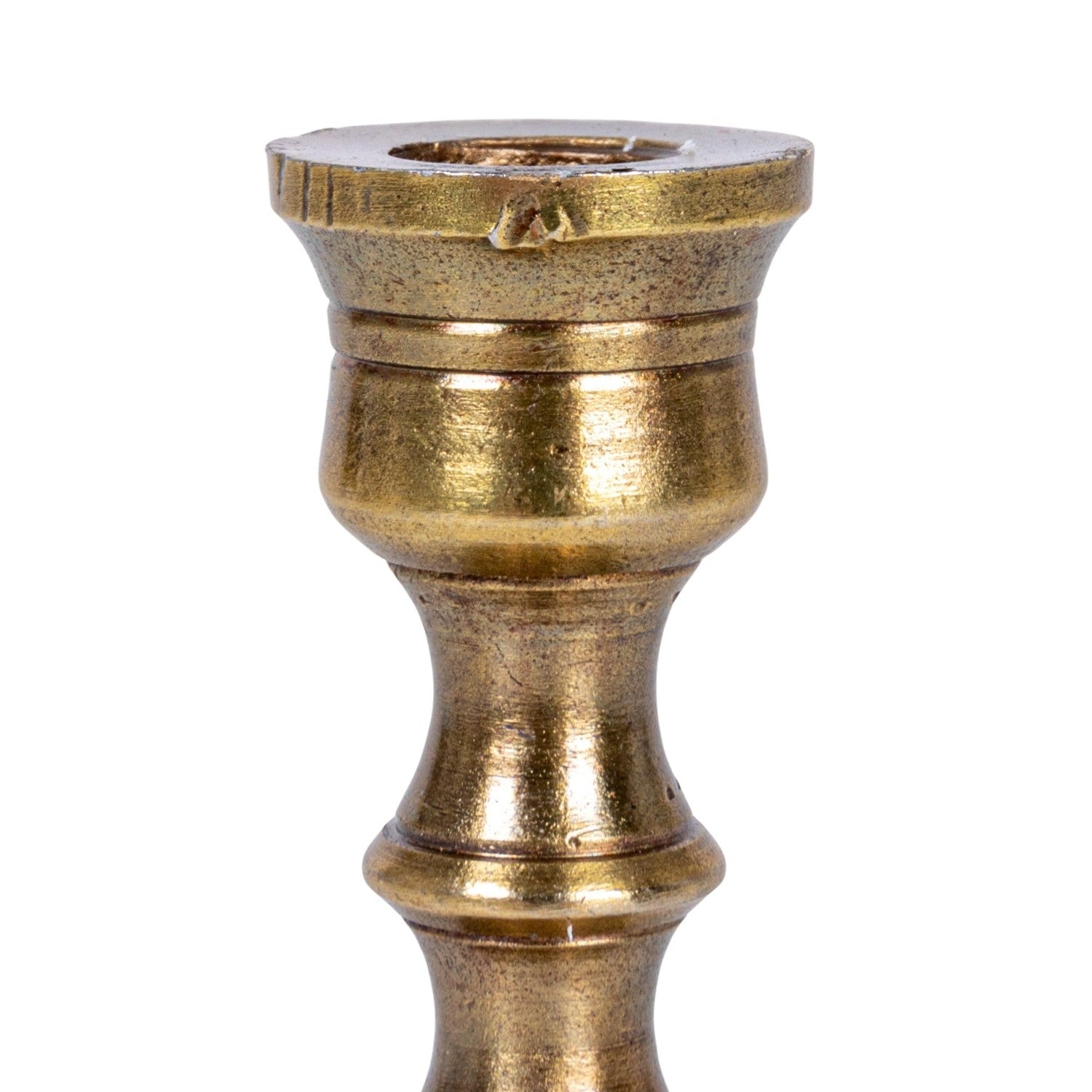 Brass candle holder on a white background.