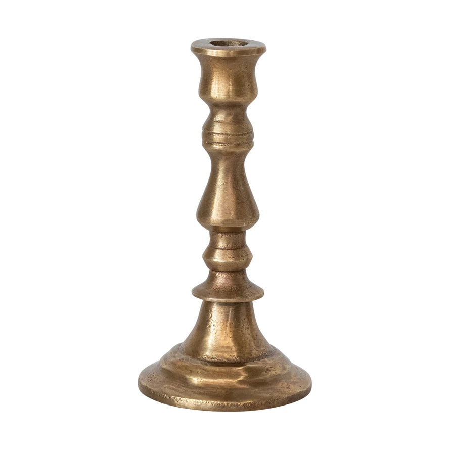 Bronze candle holder on a white background.
